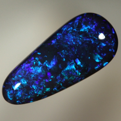 SOLID BLACK OPAL Sparkles of bright blues